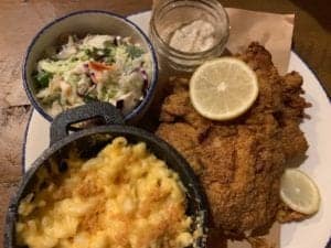 catfish dinner with cole slaw and mac and cheese