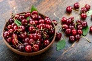 bowl of cherries with stems