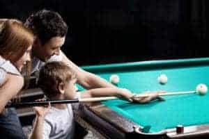 family playing pool