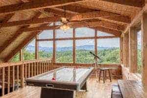 air hockey table inside of a cabin