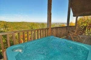 hot tub on deck of romantic 1 bedroom cabin in gatlinburg