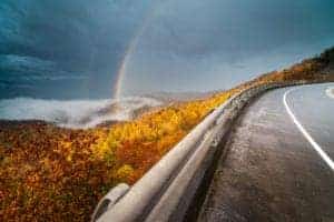 foothills parkway road with rainbow in the background