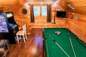 game room inside of a pigeon forge cabin