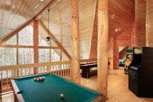 pool table and arcade games in a pet friendly cabin
