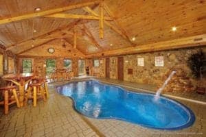 indoor pool inside of a Pigeon Forge cabin