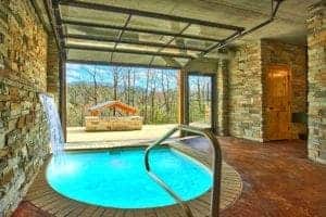 swimming pool inside of a Pigeon Forge honeymoon cabin