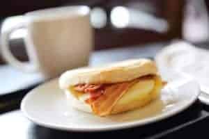 breakfast sandwich with coffee