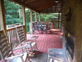 Large covered deck with comfortable seating