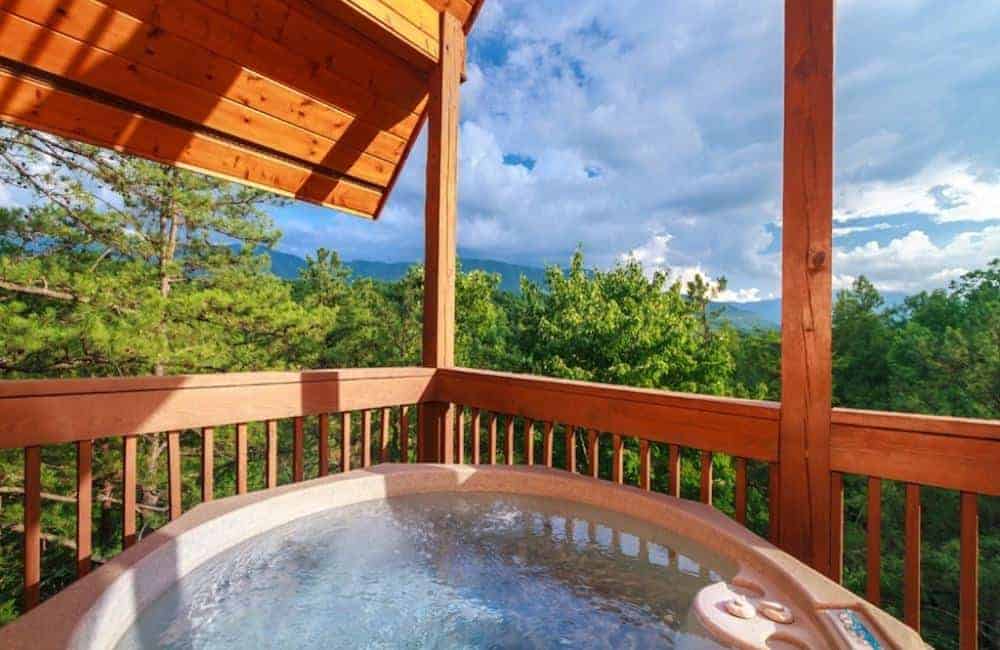 hot tub on the deck of a gatlinburg cabin