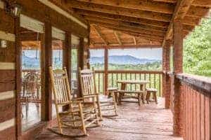 two chairs on the deck of a Gatlinburg cabin