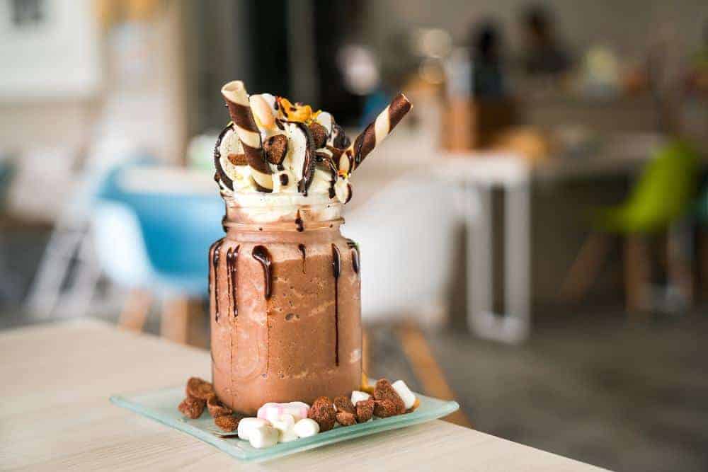 chocolate milkshake with cookies and chocolate syrup