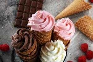 four soft serve ice cream cones