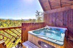 hot tub on deck of cheap pigeon forge cabin