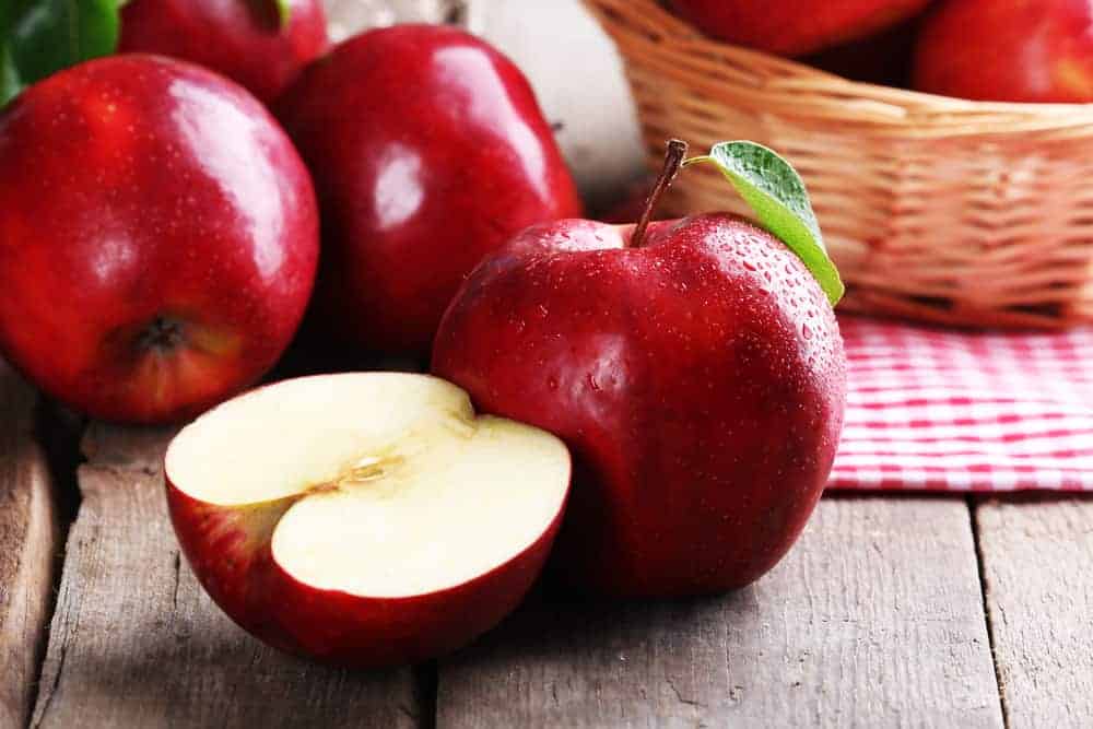 apples on wooden table