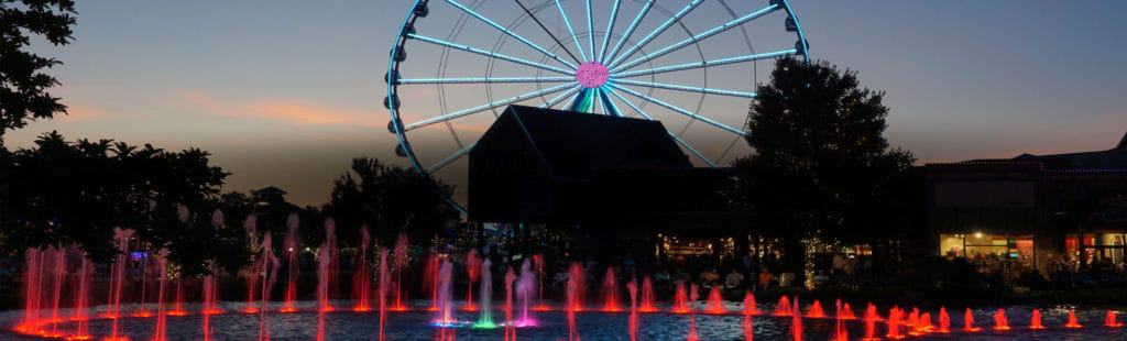 the island show fountain at dusk