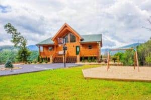 outside of Bella Vista cabin with basketball court