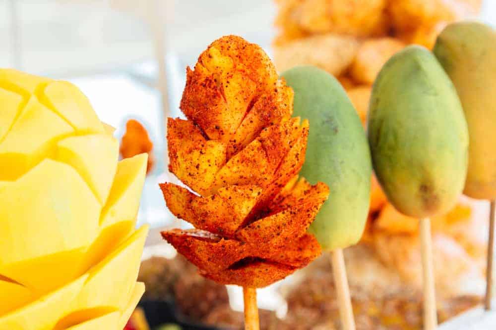 mexican street food mango with spices
