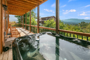 Lower deck off gameroom with hot tub. Magnificent mountain view