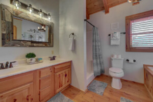 Upstairs shared bathroom w/ shower and whirlpool tub. 