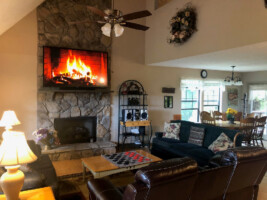 Living room with fireplace and 70