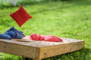 Cornhole game on the grass 