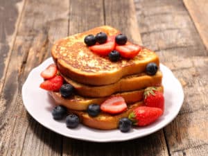 french toast with blueberries and strawberries