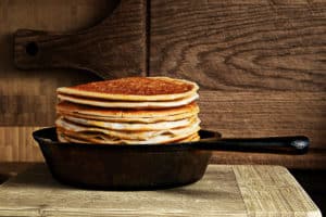 pancakes in a cast iron skillet
