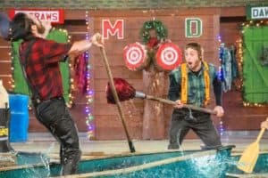 lumberjacks competing at Paula Deen's Lumberjack Feud Christmas show in Pigeon Forge