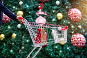 shopping cart filled with Christmas gifts