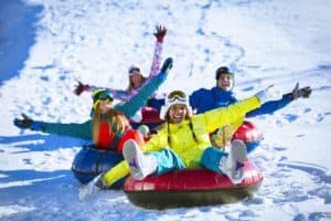 people snow tubing