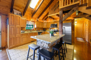 Make memories in the kitchen featuring ambient light and granite countertops.