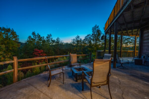 Porch swing on lower level deck offers great sunset views over the mountains.