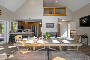 Oversized custom kitchen table with bench seating offers space for entire family!