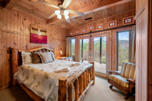 Bedroom #3: Queen bed with French doors to bottom deck and en suite bathroom