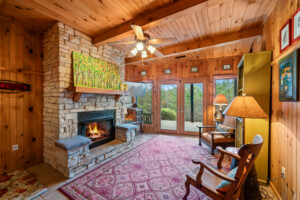 Sitting area on bottom floor has a fire place as well 