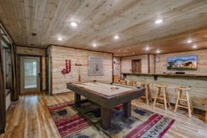 pool table inside Gatlinburg cabin with an indoor pool