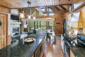 Kitchen w/ stainless appliances and granite countertops