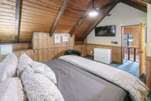 Upstairs king bedroom w/ TV