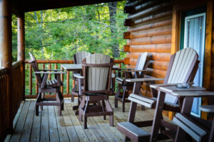 Main floor deck with table and chairs for eating outside or enjoying the sunset. 