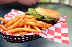 burger in basket with fries