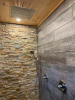 Large walk-in tiled shower. Enjoy the rain head above and/or the hand wand