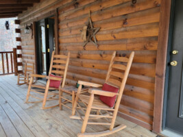 Enjoy the outdoors on the rocking chairs on the back deck