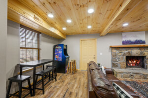 Lower level entertainment room with multicade and pub table!
