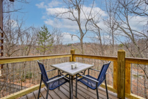 Sip your morning coffee on the rear deck with wooded views!