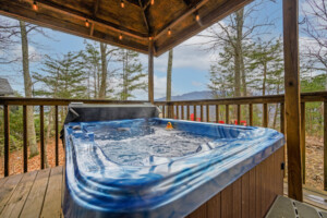Soak in the Smoky Mountain views from the relaxing hot tub!