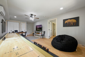 Shuffle board and poker table with large smart TV