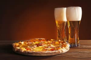 pizza with two glasses of beer