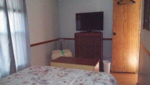 Second bedroom with full bed and HDTV. 