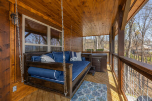 Take in the mountain air on the deck swing!