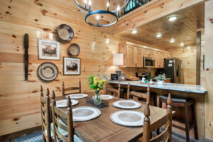 Dining table with seating for six and three barstools at bar